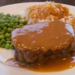 Delicious Dish Of Meatloaf And Gravy.