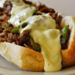 SLOW COOKER PHILLY CHEESE STEAK SANDWICHES