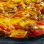 This Beef Lombardi is a hearty casserole with ground beef, egg noodles, cream cheese, tomatoes and tons of flavor!!!