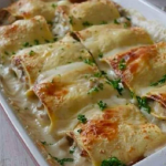 Lasagna rolls with ham and mushrooms