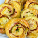 Puff pastry rolls with zucchini and cheese