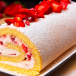 Sponge cake roll with strawberries